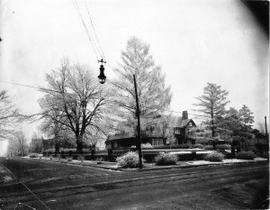 A view of the Brown house in winter, probably during the early 'Teens, judging from the carbon arc streetlamp and the interurban track running in the middle of Broadway.